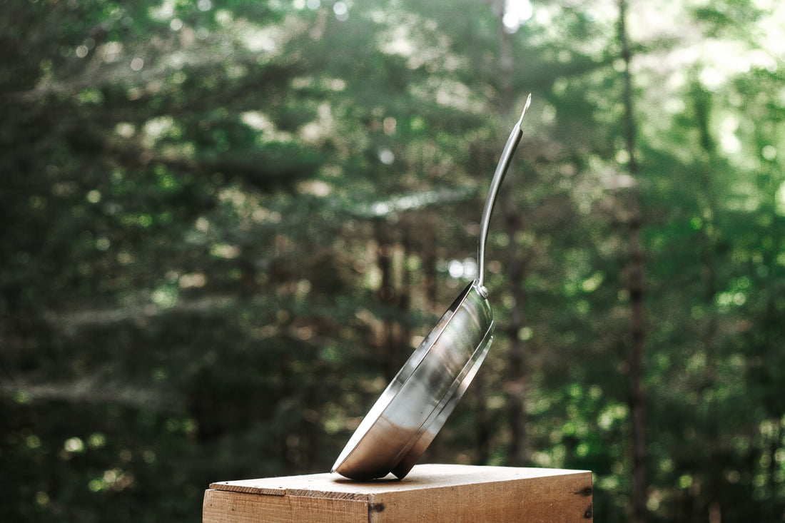 iLean-Pan right-handed stainless steel sloped frying pan side profile view outdoors